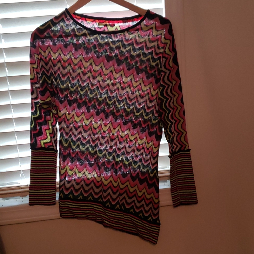 A lovely blouse with geometric patters from Italy